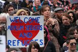 Asielzoekers welkom bord bij demonstratie