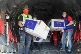Boxes of protective masks are unloaded from a military airplane coming from Bucharest, Romania to Milan, Italy as part of the Operation RescEU in the context of the COVID-19 pandemic.