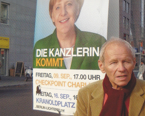 Jan Werts voor een poster van Angela Merkel